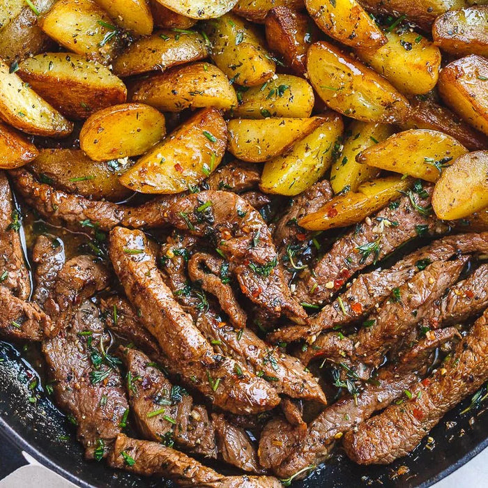 Cooking steak in a skillet