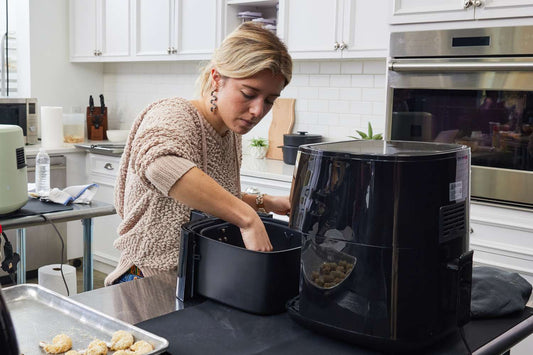 Girl using a pressure cooker air fryer combo