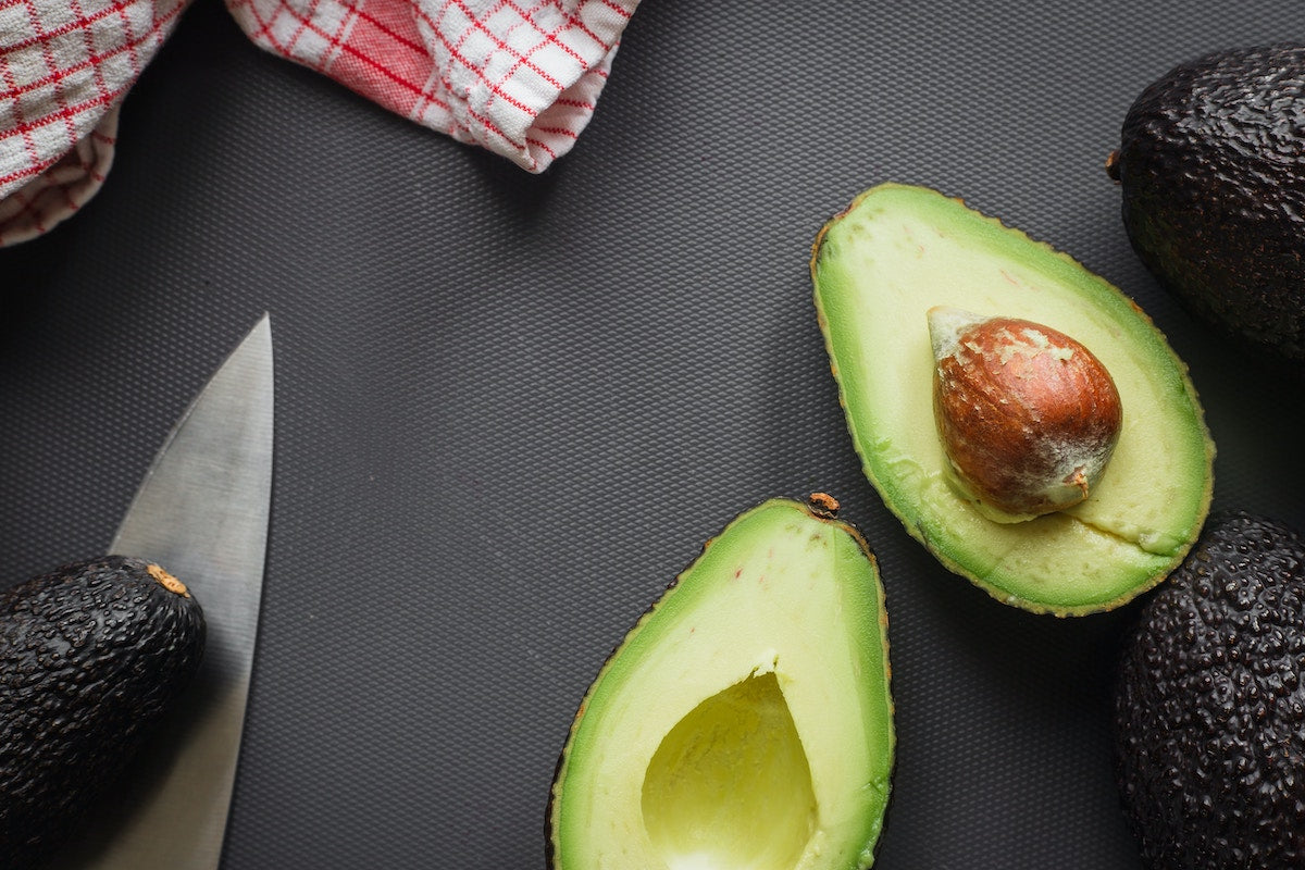 Avocado cut in half.