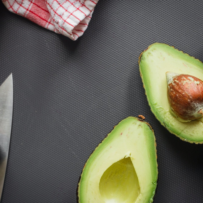 Avocado cut in half.