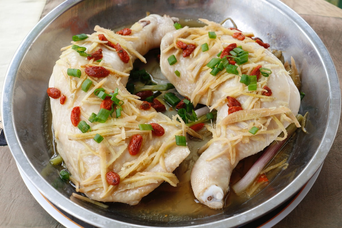 Raw chicken in a prep bowl