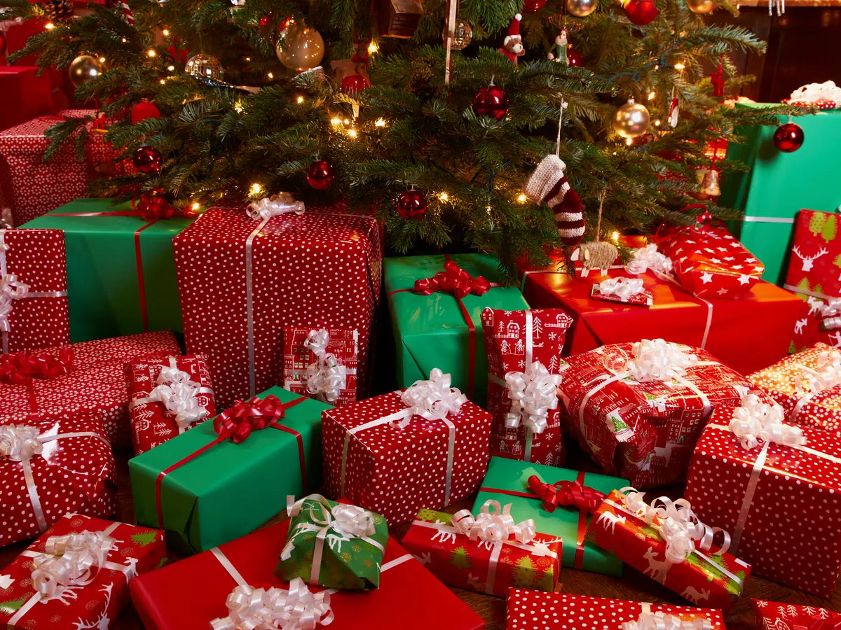 Christmas gifts under a Christmas tree