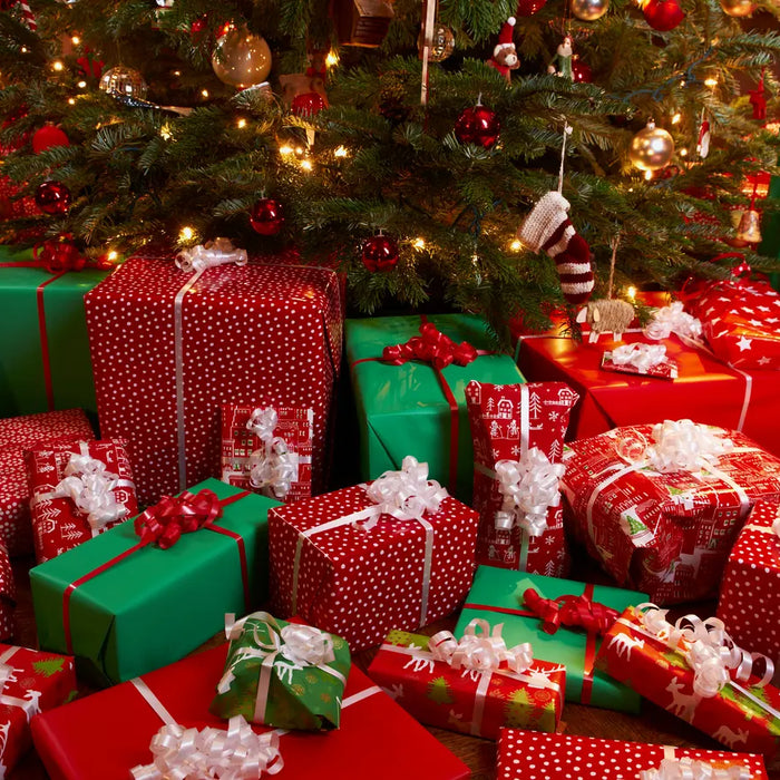 Christmas gifts under a Christmas tree