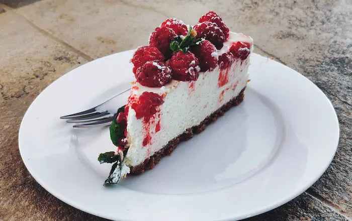 Raspberry and dark chocolate base cheesecake.