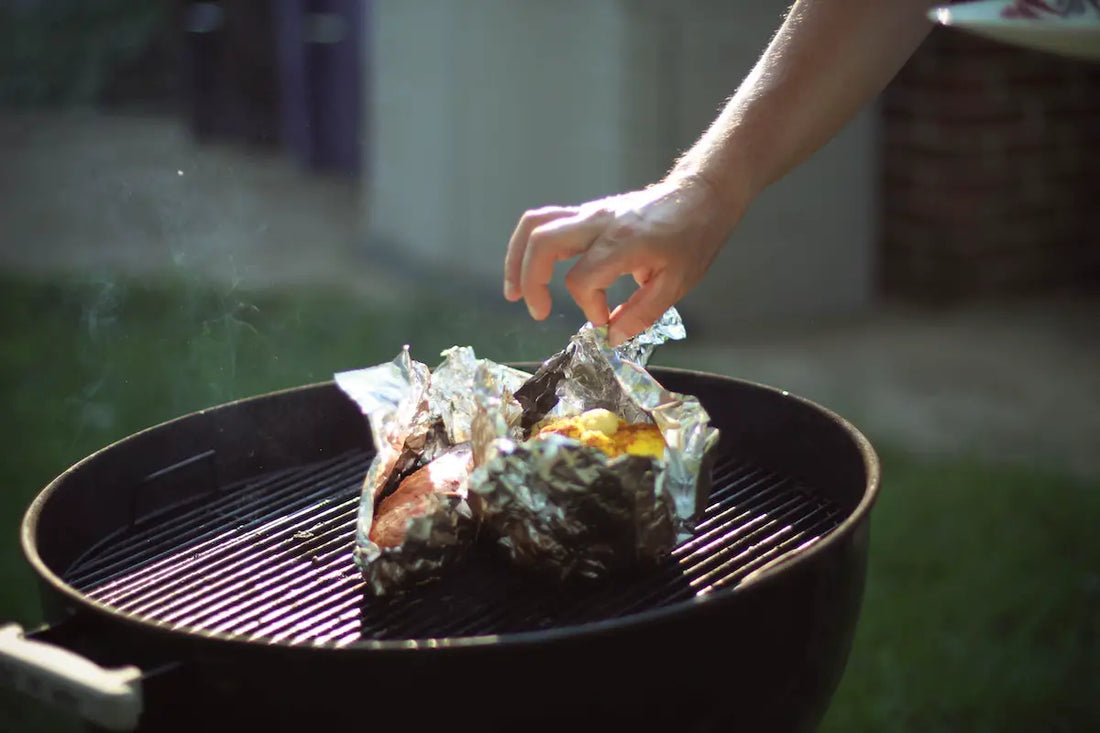 Tent with foil on a BBQ.