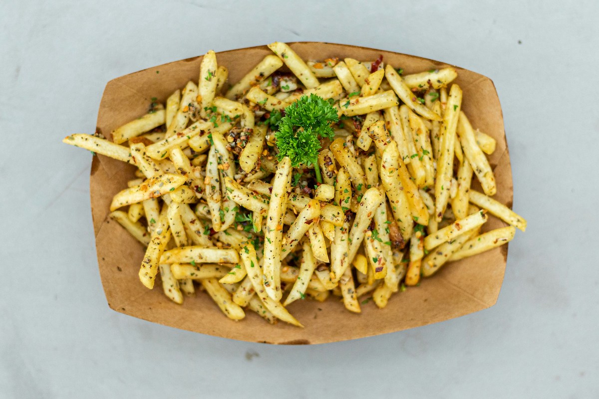 French fries sitting out on a counter