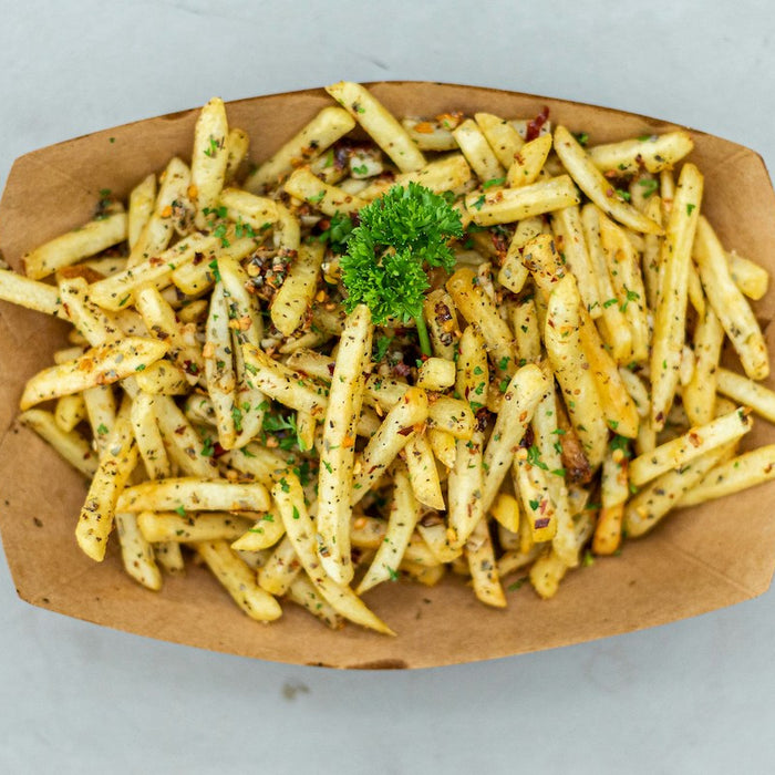 French fries sitting out on a counter