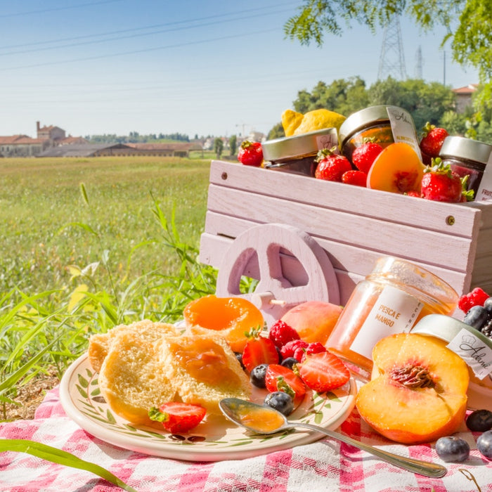 Fresh fruit outside at a picnic.