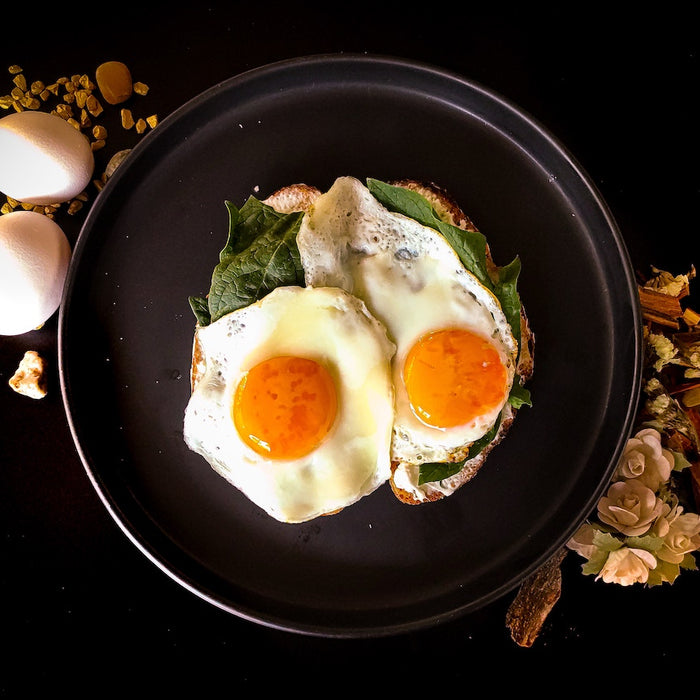 Fried eggs in a frying pan.