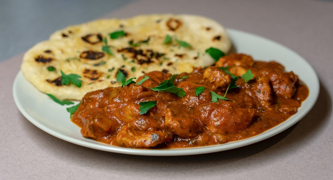 Chicken korma on a plate.