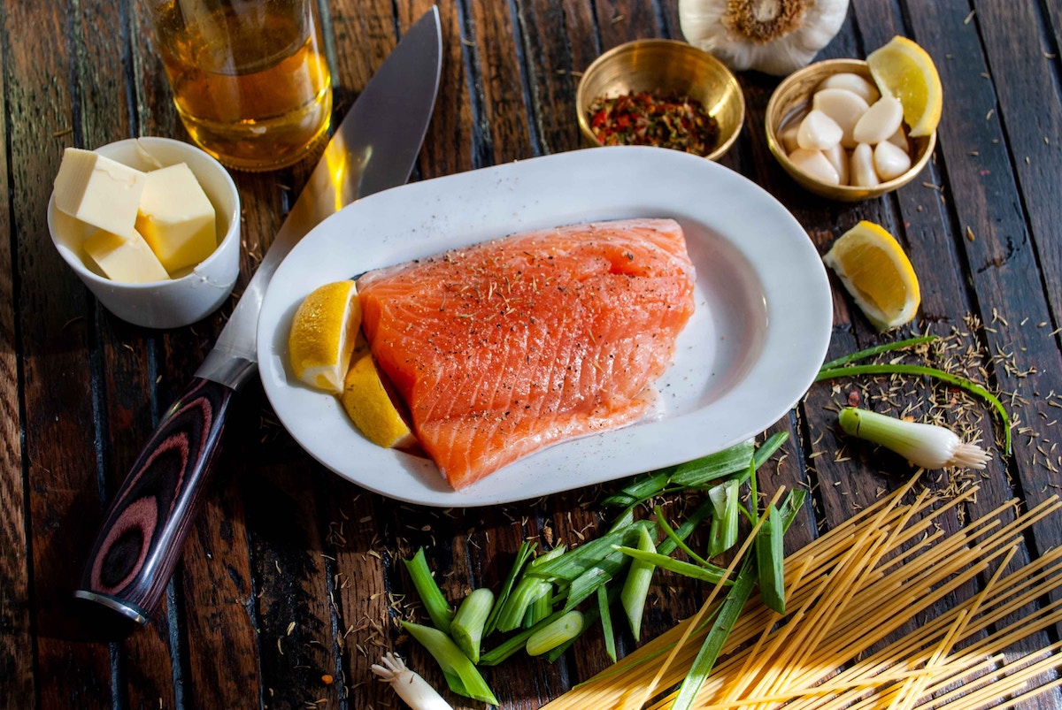 Marinating a salmon filet.