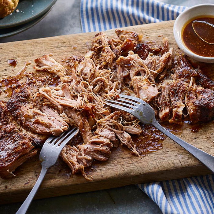 Pulled pork on a chopping board