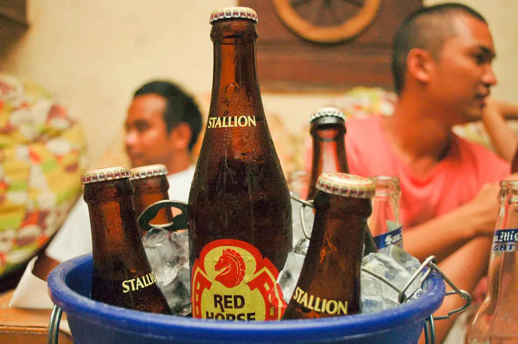 Red horse beer in a bucket.