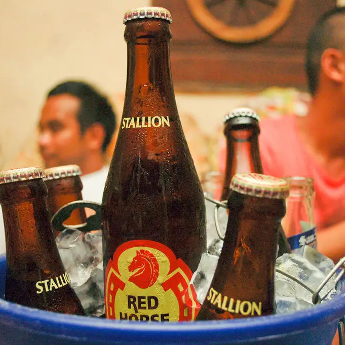 Red horse beer in a bucket.