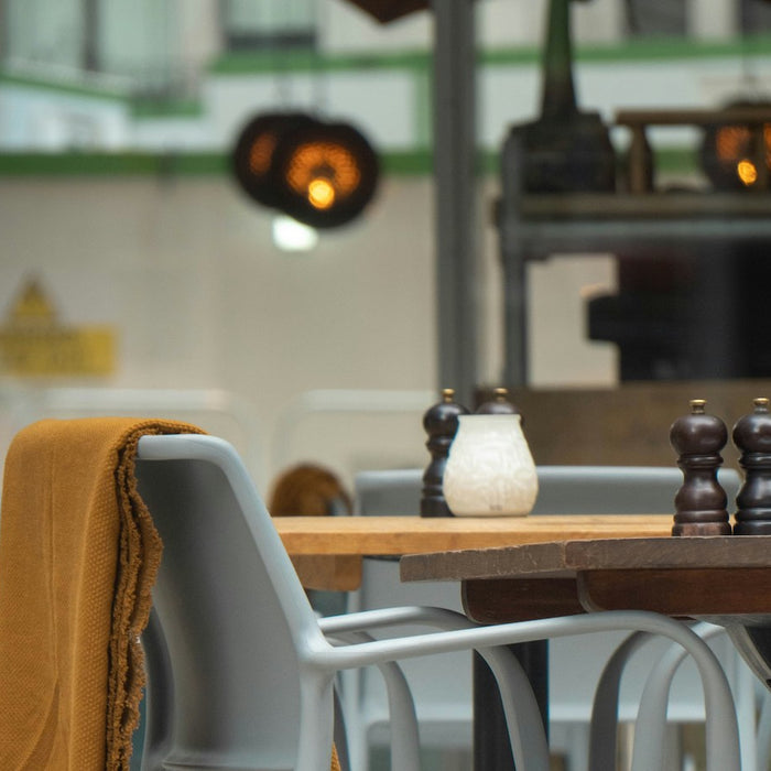 Salt and pepper shaker on a dining table.