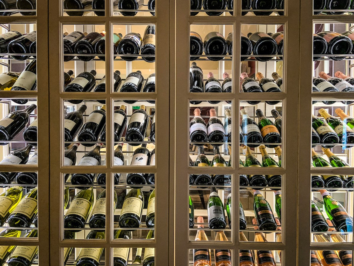 Wine collection in a wine cabinet.